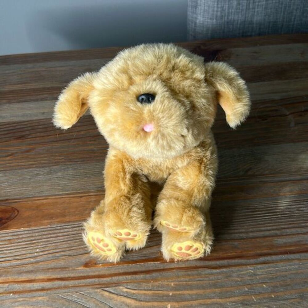 Little Live Pets Snuggles My Dream Puppy is an interactive‎ dog plush